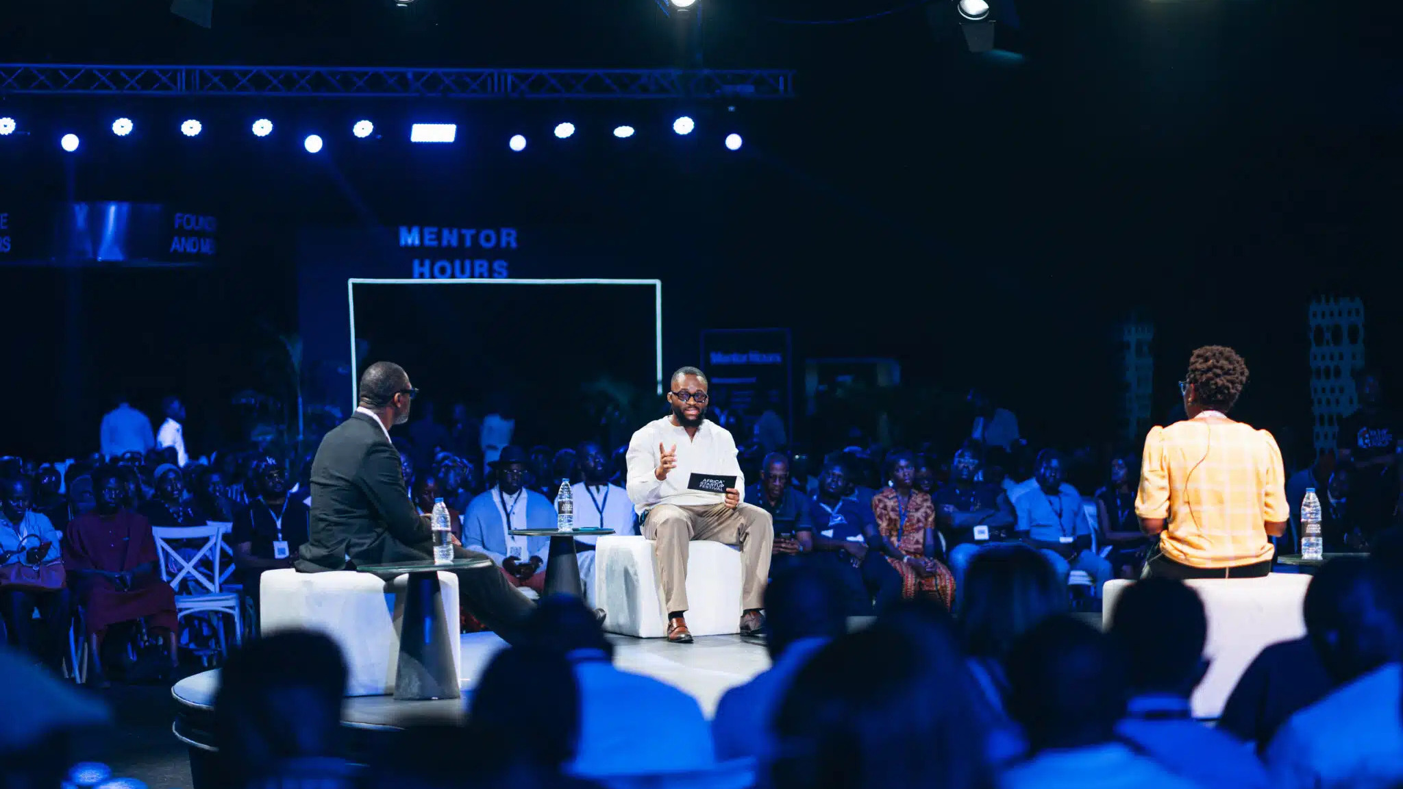 Startup founders pitching at technology summit